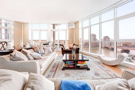 A stunning, unique three bedroom apartment with 180 degree river views in St George Wharf. - Photo 3