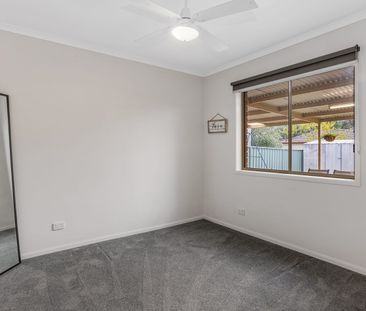 Elegant, Low-Maintenance Living in a Prime Golden Square Location - Photo 6