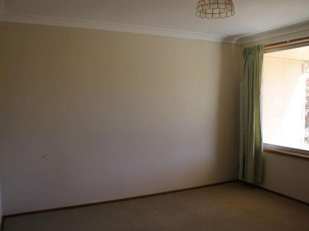 Tidy Two-Bedroom Unit in Peaceful Location - Photo 3