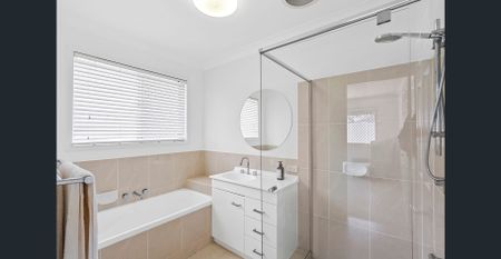 MODERN RENOVATED GEM WITH POOL AND FLEXIBLE LIVING SPACES - Photo 3