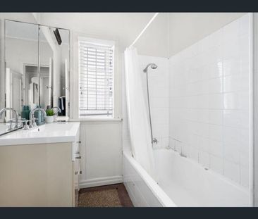 Charming Two-Bedroom Home with Timber Floors and Spacious Deck - Photo 1