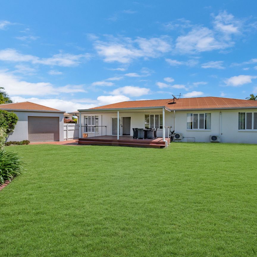 Family-Friendly Gem with Expansive Entertaining Deck & Yard Maintenance Included - Photo 1