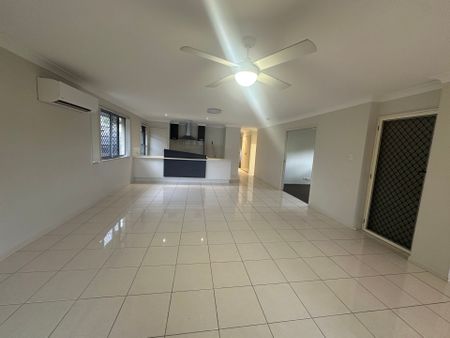 Comfortable and Convenient 4-Bedroom Family Home - Photo 4