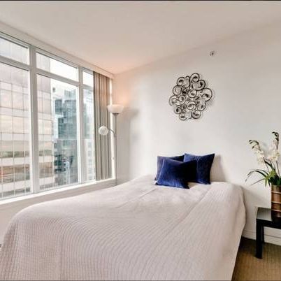 FULLY FURNISHED 1 BED & DEN w/ Standout Balcony- @ The Hudson Building - Photo 1