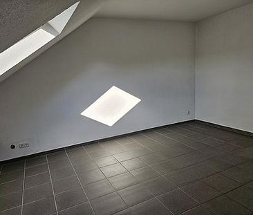 Moderne Dachgeschosswohnung in ruhiger Lage - Foto 1