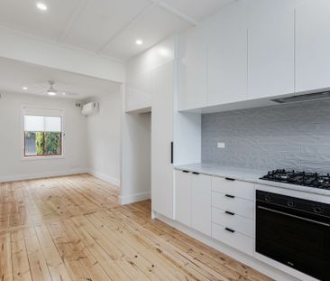 Newly Renovated Home with Huge Backyard - Photo 1