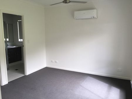 Family Home in Coomera Springs with Several Living Areas and Large Yard - Photo 3