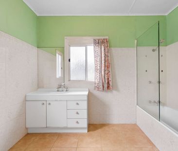 Charming Post-War Home with Spacious Living & Backyard in Holland P... - Photo 5