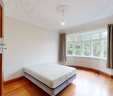 CENTRALLY LOCATED 4 BEDROOM HOME - Photo 2