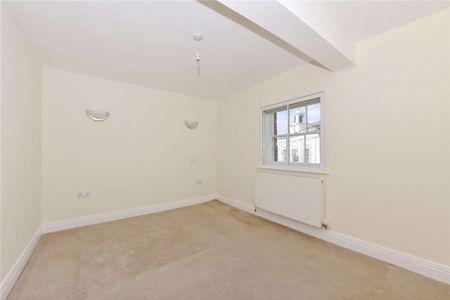 Centrally located one bedroom top floor apartment. One allocated parking space included. - Photo 3