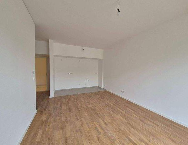 Erstbezug nach Sanierung - Schicke 2-Zimmer mit Parkett, Balkon, EBK u. Fußbodenheizung - Foto 1