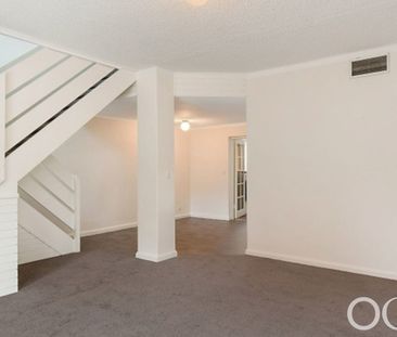 Open the Door To Stylish Townhouse Living in a Prime Adelaide Location - Photo 2