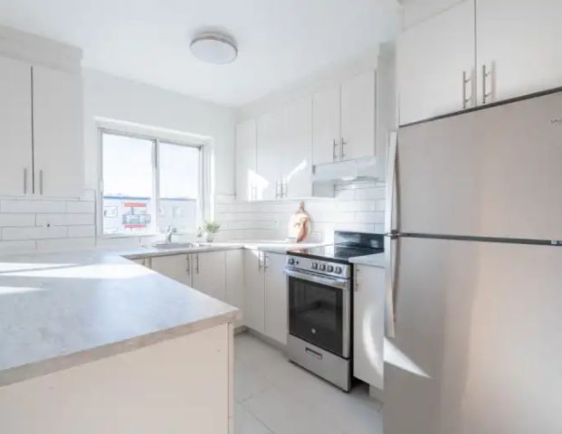 Villa Topaze | 390 Boulevard Cote Vertu Ouest, Montreal - Photo 1
