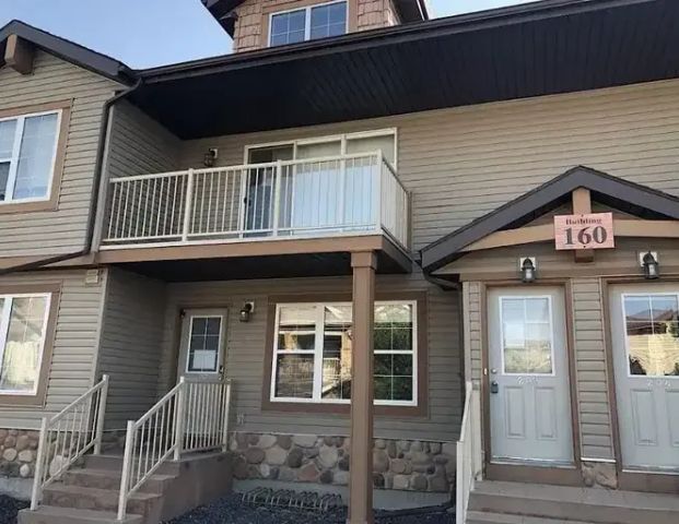 Nice 2 bedroom 'Stacked Townhouse' for Rent | 203 - 160 Panatella Landing NW, Calgary - Photo 1