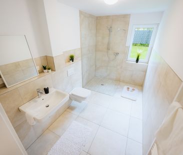 Neubau-Terrassenwohnung mit Garten und Stellplatz! - Foto 5