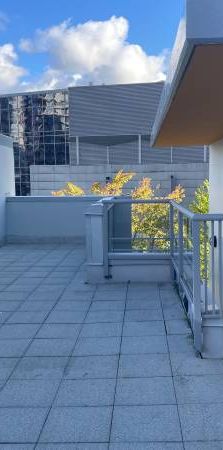 FURNISHED TWO BED & DEN TOWNHOUSE with 800 SQF ROOF DECK & PATIO - Photo 1