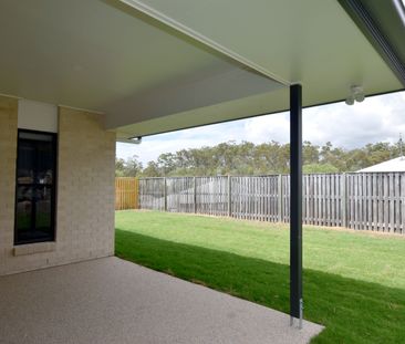 MODERN FOUR BEDROOM HOME IN THE HEART OF RIVERSTONE RISE - Photo 4