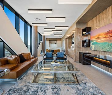 Property Managed I Stylish Coastal Living in the Heart of Main Beach - Photo 1
