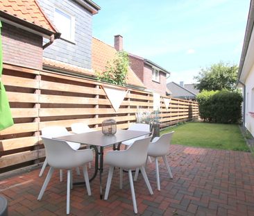 Stilvolle Erdgeschosswohnung mit Einbauküche und Terrasse in Wiefel... - Foto 1