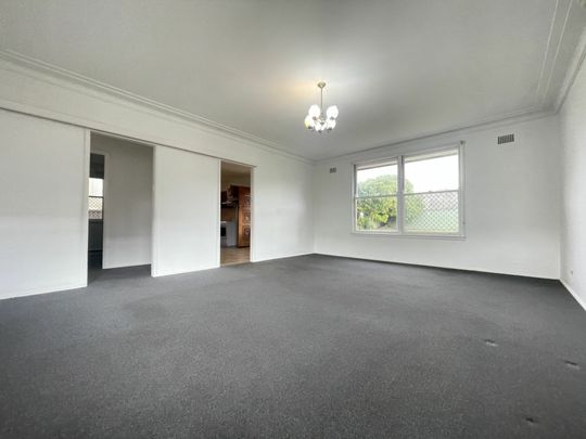 Charming Three-Bedroom Home in a Prime Location - Photo 1