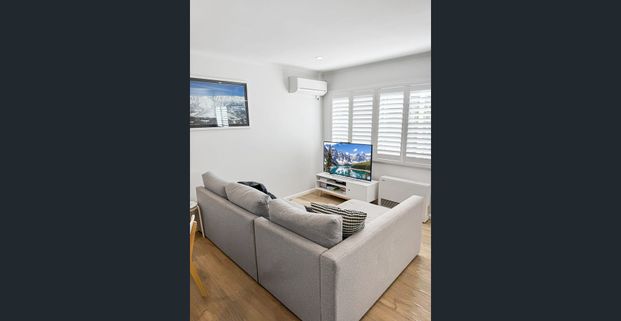 Modern 2-Bedroom Apartment in the Heart of Town - Photo 1