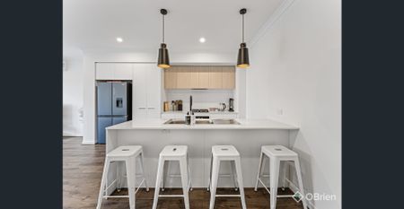 Stylish Townhouse Offering Space, Comfort, and Convenience - Photo 3