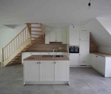 Duplexappartement met één slaapkamer, autostaanplaats en groot terras - Photo 4