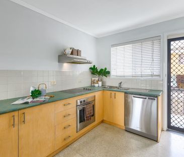 Rare Unit with Courtyard in Quiet Boutique Complex - Photo 1