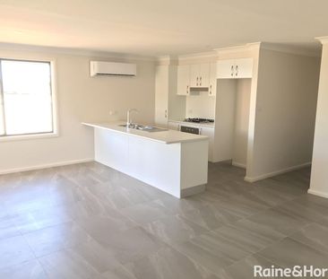 NEAR NEW 4 BEDROOM HOME - Photo 5