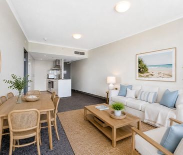 Low-maintenance living in a central location. - Photo 1