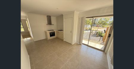 Brand New 2-Bedroom Duplex with Lock-Up Garage - Photo 2