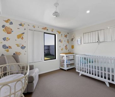 Spacious 4-Bedroom, 2-Living Gem with Solar - Photo 6