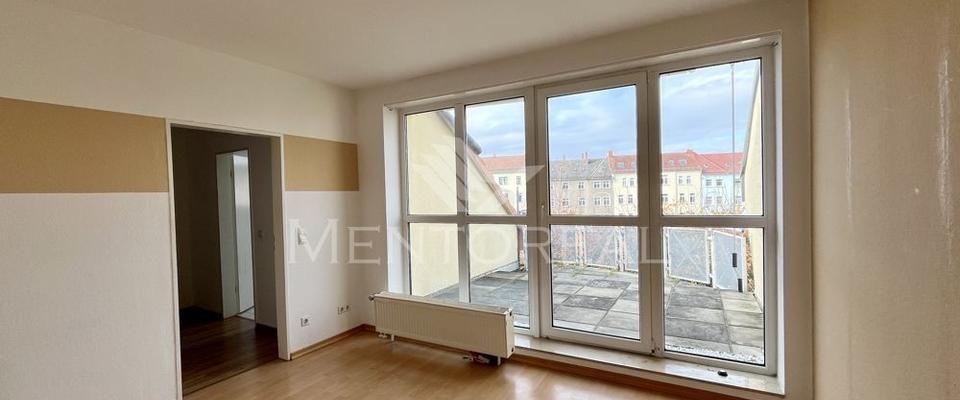 Gemütliche Dachgeschosswohnung mit großer Sonnenterrasse - Foto 1