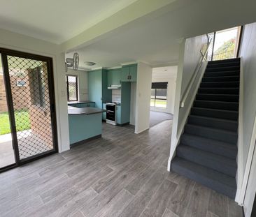 RENOVATED DUAL-LEVEL UNIT - Photo 1