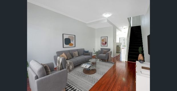 Spacious Two Bedroom Townhouse with Three Car Garage - Photo 1