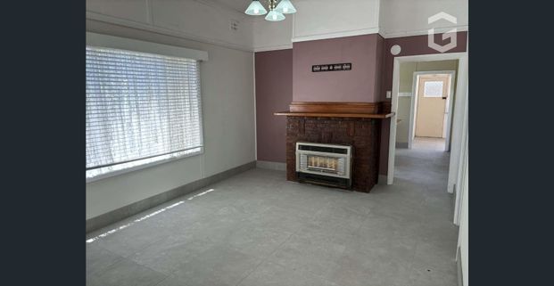 Charming Family Home in the Heart of Town - Photo 1