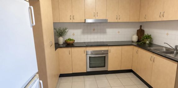 Conveniently Located Townhouse with Double Lock-Up Garage - Photo 2