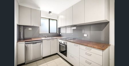 Air-Conditioned Renovated Two-Bedroom Unit with Two Balconies! - Photo 2