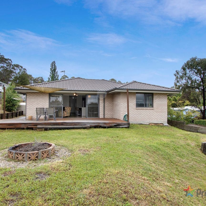 CONVENIENTLY LOCATED MODERN HOME - Photo 1