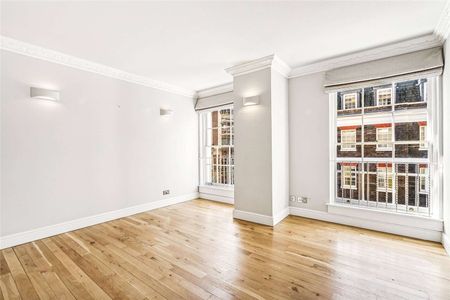An elegant and generously proportioned lateral 3 bedroom, 2 bathroom apartment in this beautiful building and in one of Westminster's most iconic locations next to St James's Park. - Photo 2