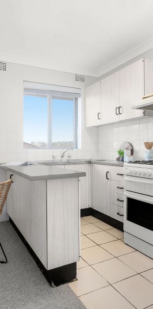 Top-Floor One-Bedroom with a Private Outdoor Balcony - Photo 1