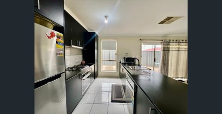 Spacious 4-Bedroom Home with Huge Solar System - Photo 2