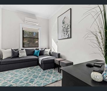 Spacious Family Retreat with Huge Deck & Premium Finishes! - Photo 6