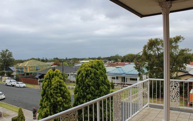 TOP FLOOR APARTMENT WITH OCEAN VIEWS - Photo 1