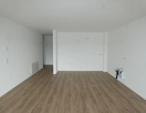 Neubau/Erstbezug: Modern geschnittene 3-Zimmer-Wohnung mit traumhaftem Ausblick - Photo 1