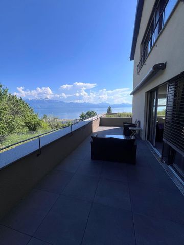 Appartement moderne de 2.5 pièces avec vue exceptionnelle sur le lac et les montagnes - Photo 2
