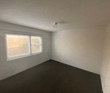 This tidy ground-level two-bedroom unit is perfectly positioned in ... - Photo 5