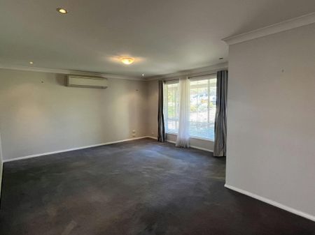 Bright Family Home with Sunroom and Outdoor Living Space - Photo 2