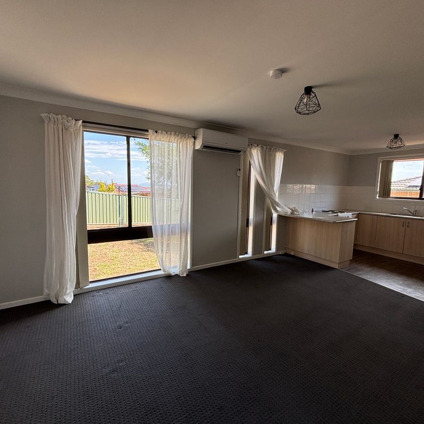 Updated Three Bedroom Unit - Photo 1