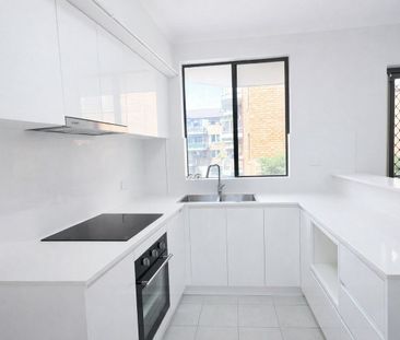 Fully Renovated First Floor 2-Bedroom Unit in Quiet Location - Photo 3